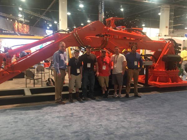 NPK booth, ConExpo 2017 - B6500 pedestal boom and NPK sales team members with J.R. Vinagro staff