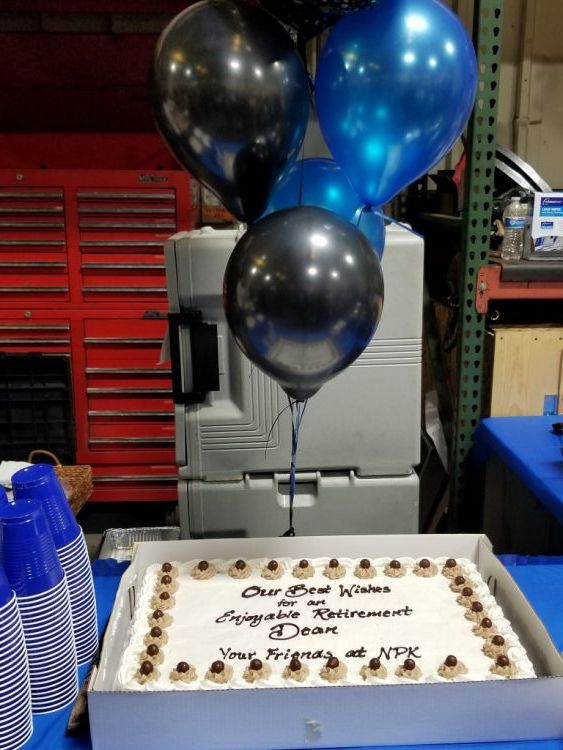 The cake: Our Best Wished for an Enjoyable Retirement, Dean. Your Friends at NPK.