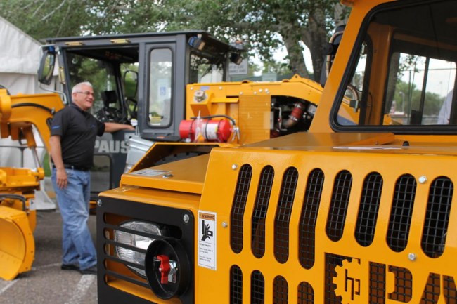 Elko Daily Free Press - Elko Mining Expo 2018 - gentleman checking out the PG10 grader